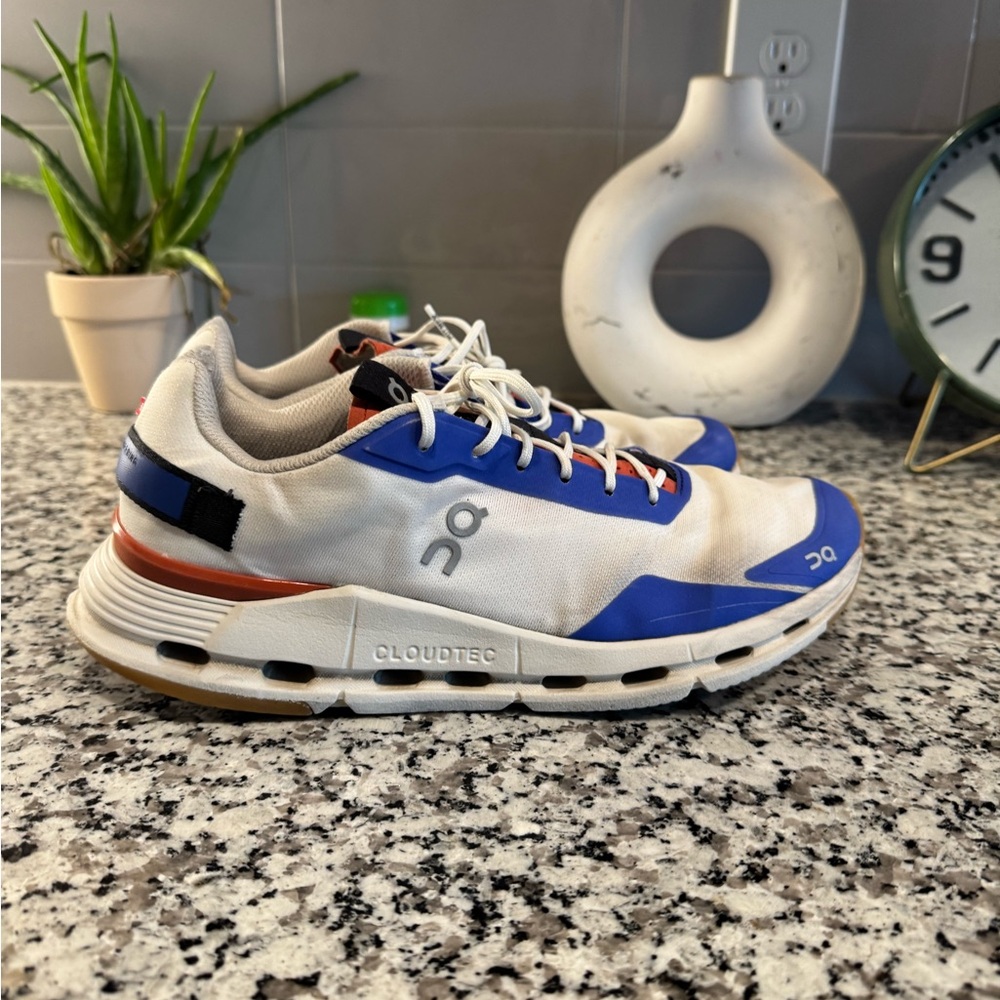 On Running Woman’s Blue and White Sneakers